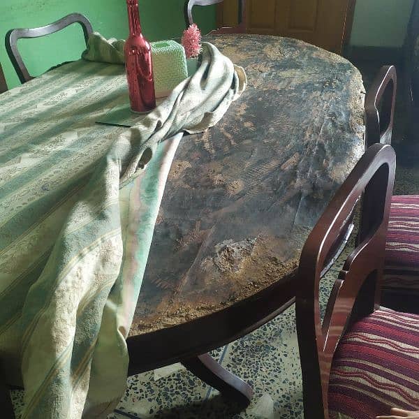 Used Wooden Dining table with 6 Chairs , condition 5/10 5