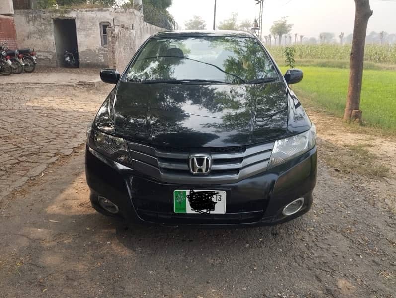 Honda City IVTEC 2013 black color 100 percent genuine home used car… 3