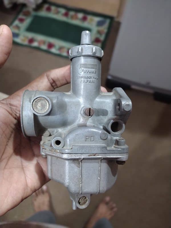 125 carborator hai 4