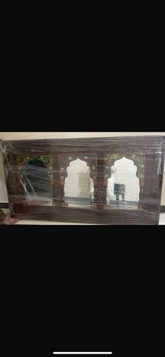 Wall hanging mirror brand new.