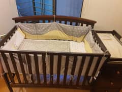 cot with changing station