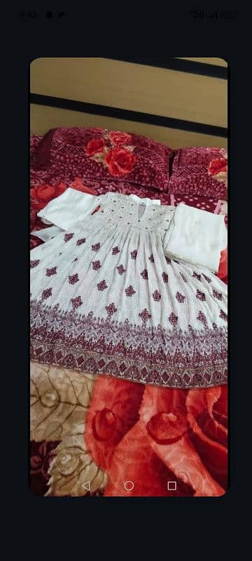 Elegant white and mehroon dress. . 1