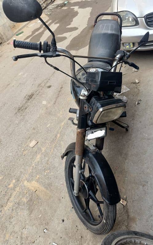 70cc unique bike with black alloy rims 1