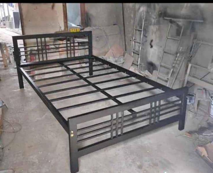 iron and steel bed with sidetables 5