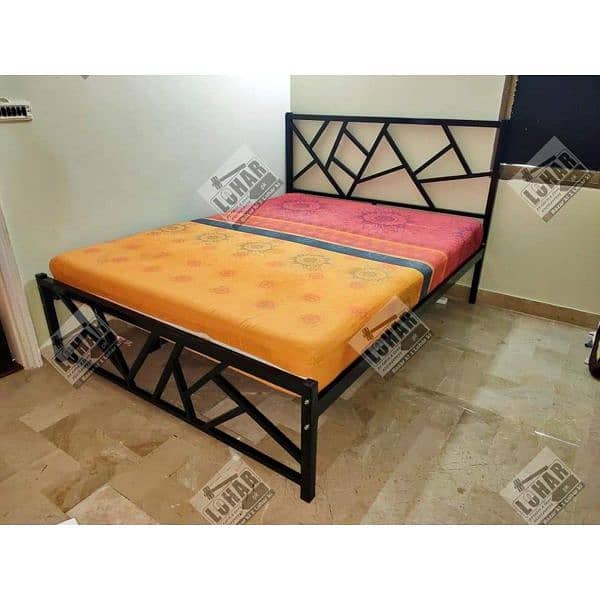 iron and steel bed with sidetables 8