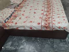 Used bed with side table and dressing