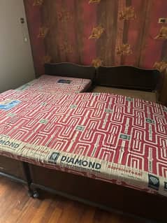 2 single beds with mattress