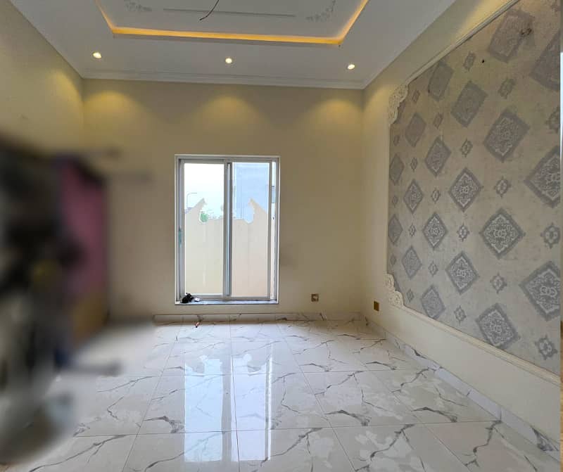 Luxury And Comfort Unite In This 4-Bedroom Residence In DHA 9 Town Block A" 1