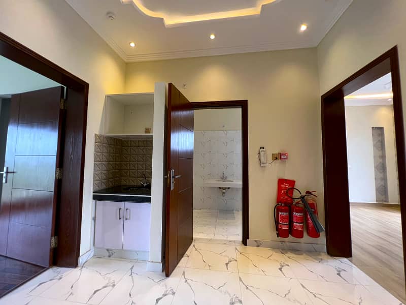 Luxury And Comfort Unite In This 4-Bedroom Residence In DHA 9 Town Block A" 9