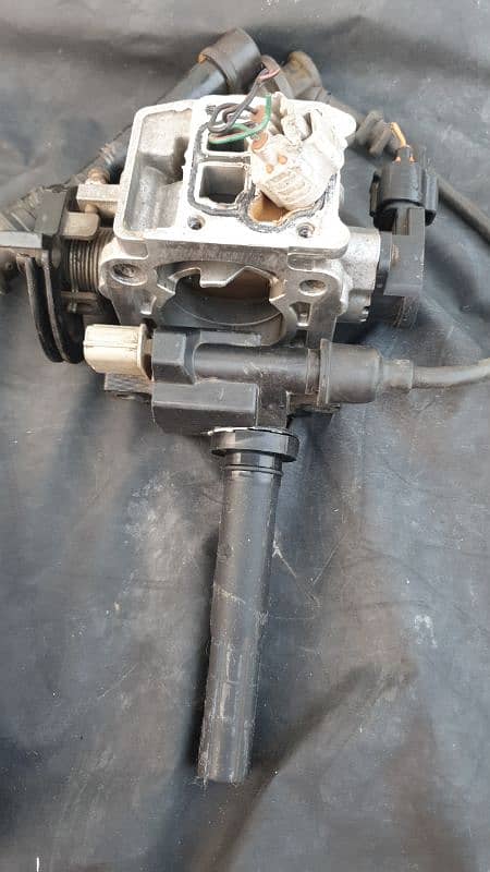 Suzuki Liana Original Throttle Body and a Coil Original Denso. 6