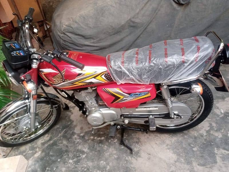 honda 125 red 0