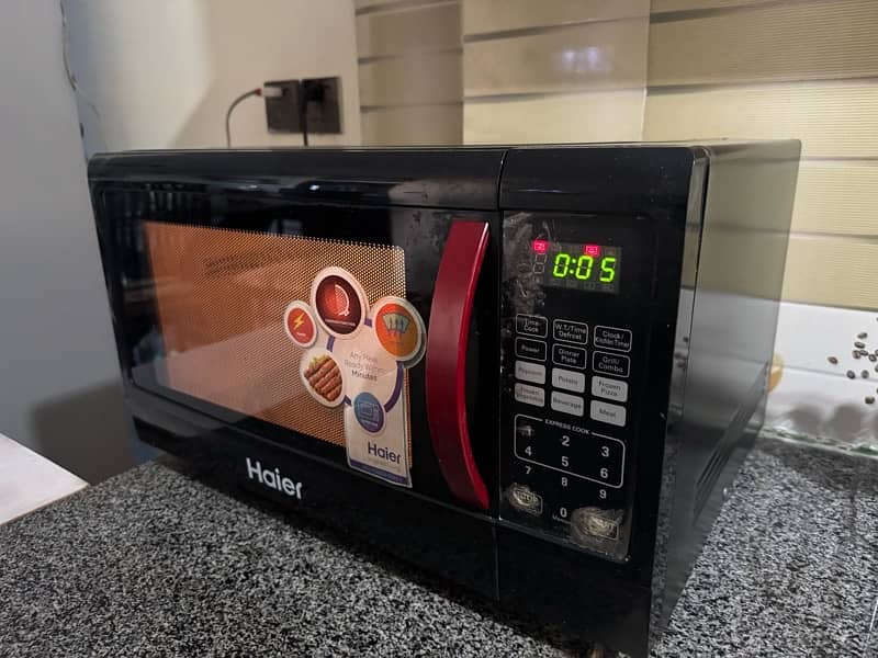 haier HMN-45110EGB microwave oven in perfect condition for sale 0