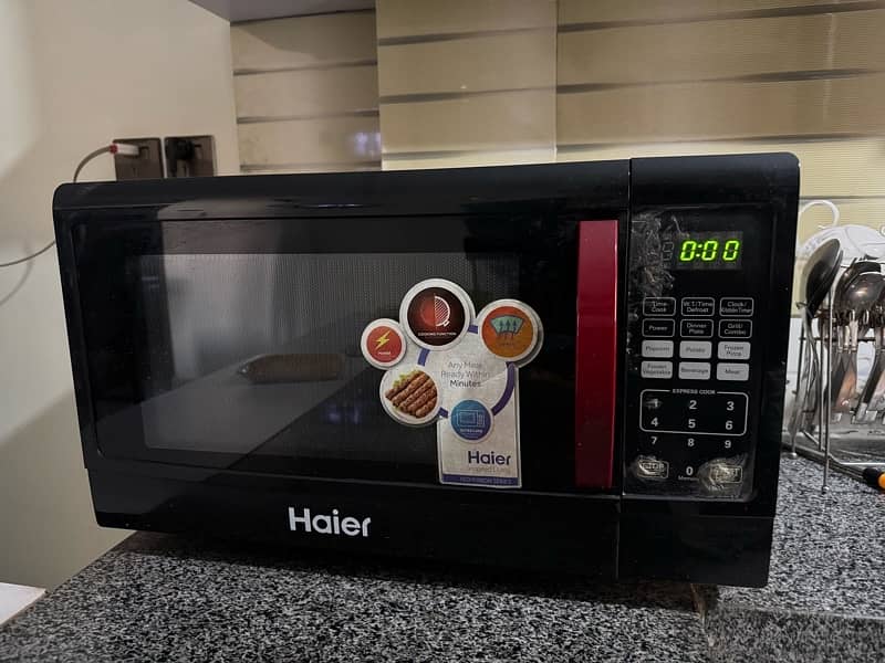 haier HMN-45110EGB microwave oven in perfect condition for sale 2