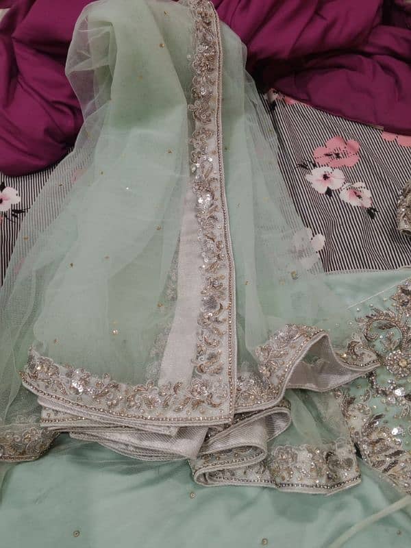 Good Condition Lehnga.   small size. Ice blue color.  Made on order. 1