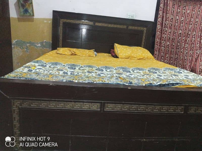 Wooden bed for sale good conditions . 1