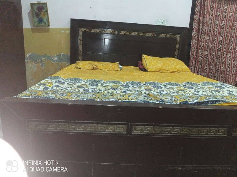 Wooden bed for sale good conditions . 2