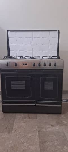 Cooking range and microwave oven