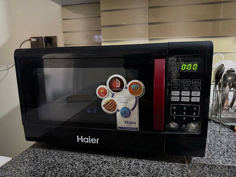 Haier HMN-45110EGB microwave oven in perfect condition for sale 0