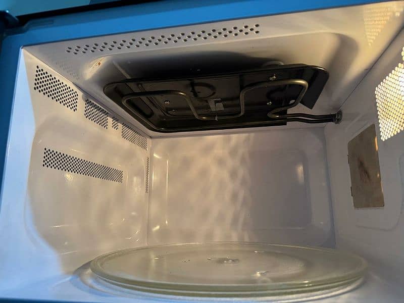 Haier HMN-45110EGB microwave oven in perfect condition for sale 4