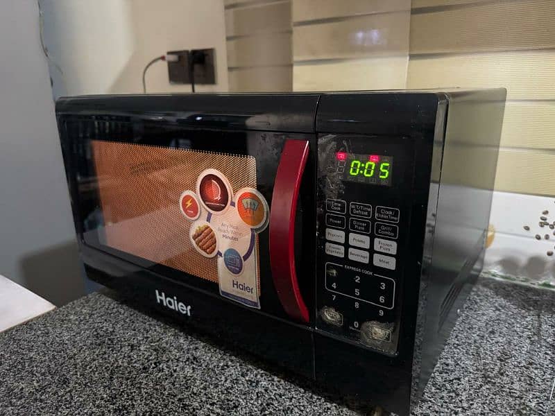 Haier HMN-45110EGB microwave oven in perfect condition for sale 5