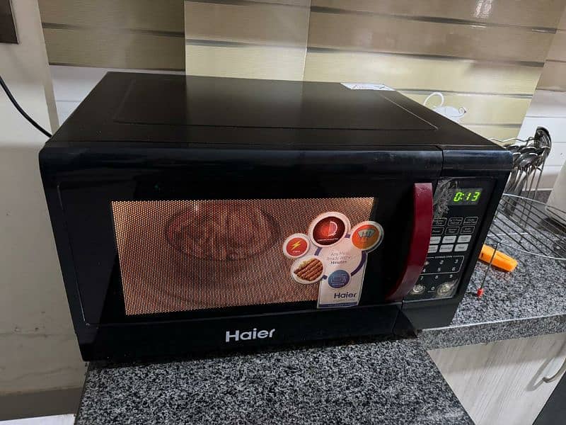 Haier HMN-45110EGB microwave oven in perfect condition for sale 6