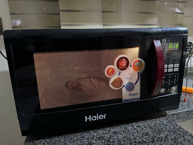 Haier HMN-45110EGB microwave oven in perfect condition for sale 7