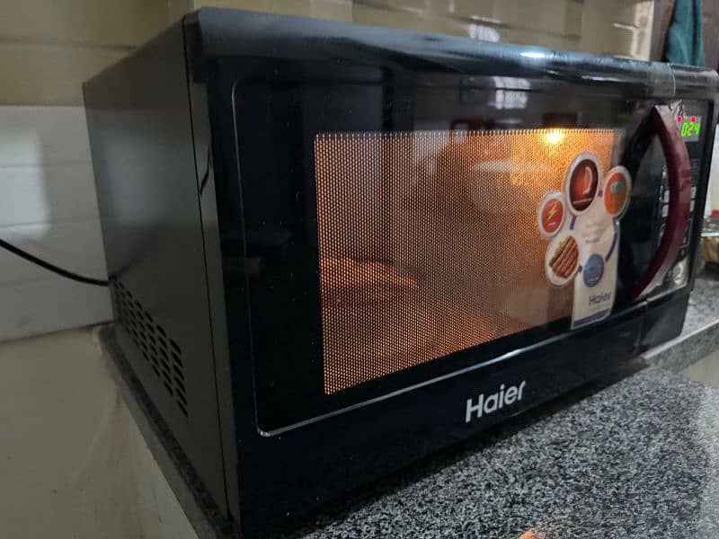 Haier HMN-45110EGB microwave oven in perfect condition for sale 8