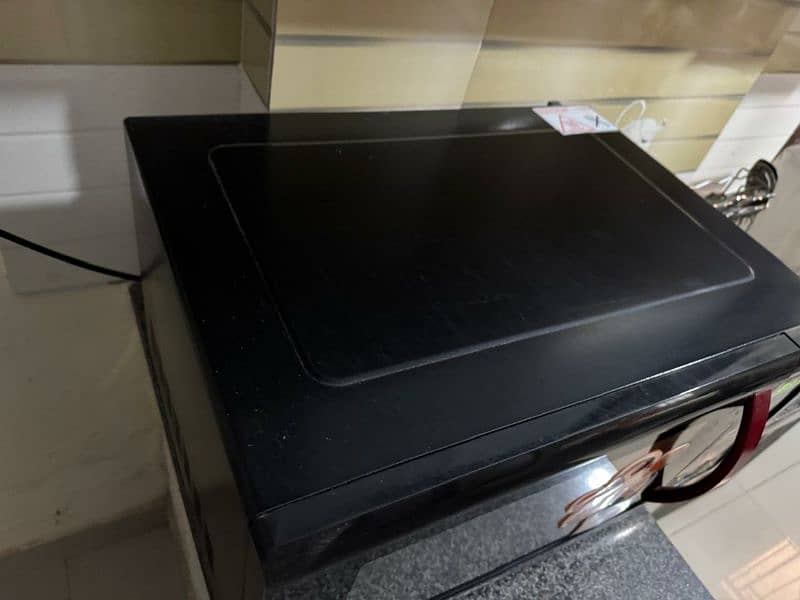 Haier HMN-45110EGB microwave oven in perfect condition for sale 9