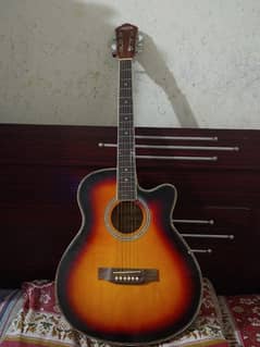 it's Sami acoustic guitar 40 inch nice condition