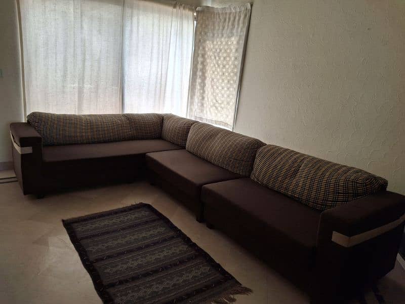 7 Seater L shaped sofa in very good condition 1