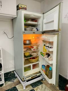 Hair company fridge refrigerator is in working conditions