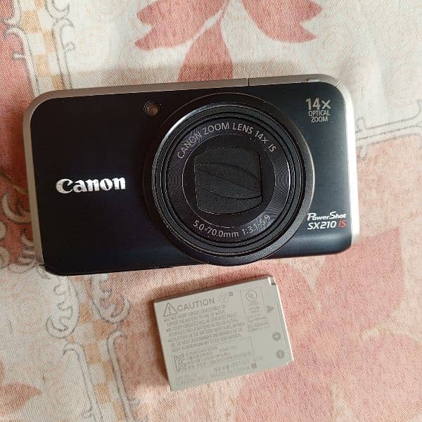 Canon camera model sx210 is 3