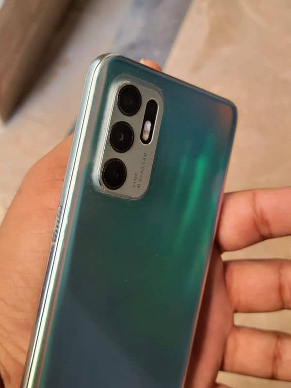 Oppo Reno 6 10/10 condition all okay with box and original charger 0