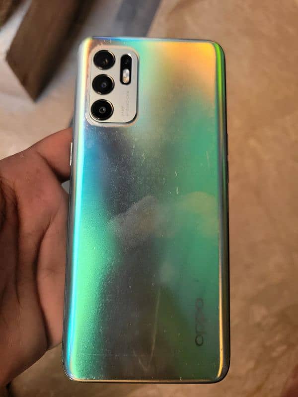 Oppo Reno 6 10/10 condition all okay with box and original charger 6