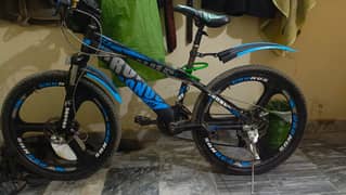 24in* mountain bicycle with suspension!