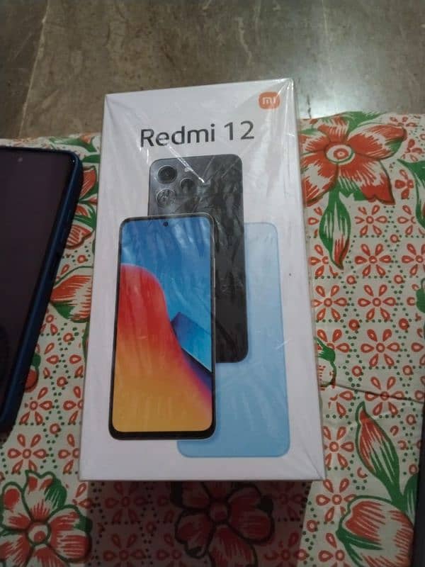 redmi 12 8+4 128 complete samna hai bilkul ok hai koi masla nahi hai 1