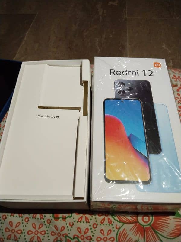 redmi 12 8+4 128 complete samna hai bilkul ok hai koi masla nahi hai 2