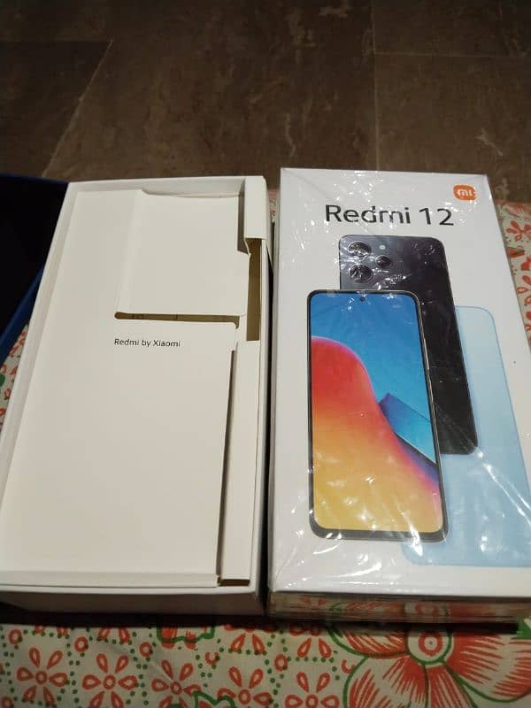 redmi 12 8+4 128 complete samna hai bilkul ok hai koi masla nahi hai 3