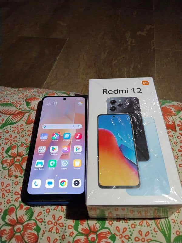 redmi 12 8+4 128 complete samna hai bilkul ok hai koi masla nahi hai 6