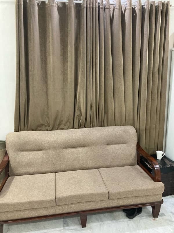 6 seater sofa set with curtains and side table 1