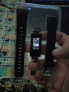 two smart watches and one fitness tracker band 0