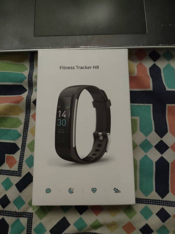 two smart watches and one fitness tracker band 2