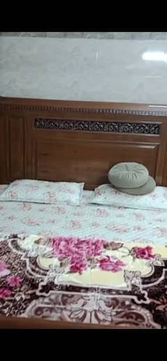 pure wooden bed with one side table