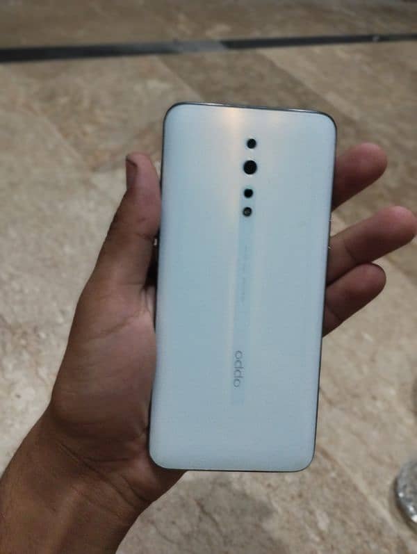 oppo reno z 8.256 sirf face lock ha fingerprint nahi ha box available 1