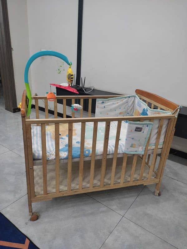 Wooden Baby Cot with Swing and Swimg Toy 1