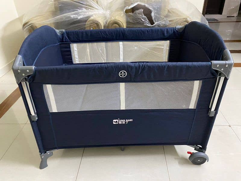 Baby cot for sell in dark blue colour 0