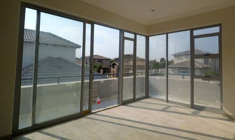 Safety Grills,Main Gates,Glass & steel Railings,Aluminum windows Fiber 12