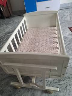 un used baby swing cot