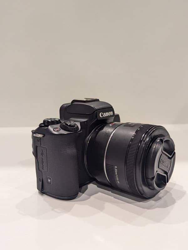 Canon EOS M50 with 50mm lens. 1