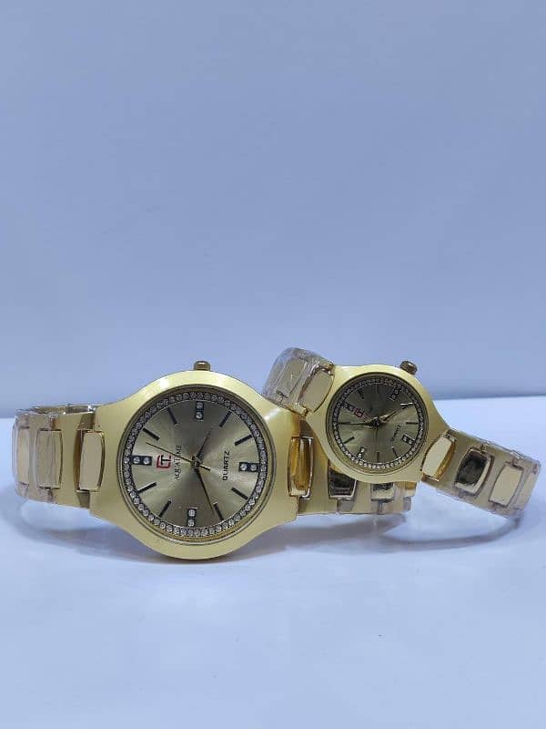 Couple gold chain watches 1